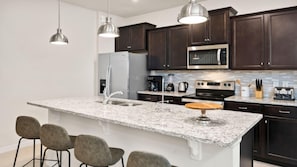 Casa, varias camas | Cocina privada
