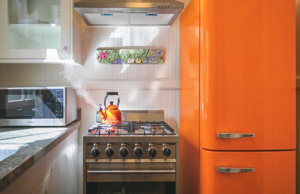 Fridge, microwave, oven, stovetop - Historic Turn-of-the-Century Bungalow in the heart of Volcano Village. (Volcano)