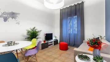 Appartamento Deluxe, 1 camera da letto | Area soggiorno | TV a schermo piatto