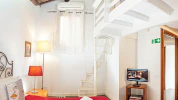 Apartamento luxo | 1 quarto, edredons de pluma, ferros/tábuas de passar roupa