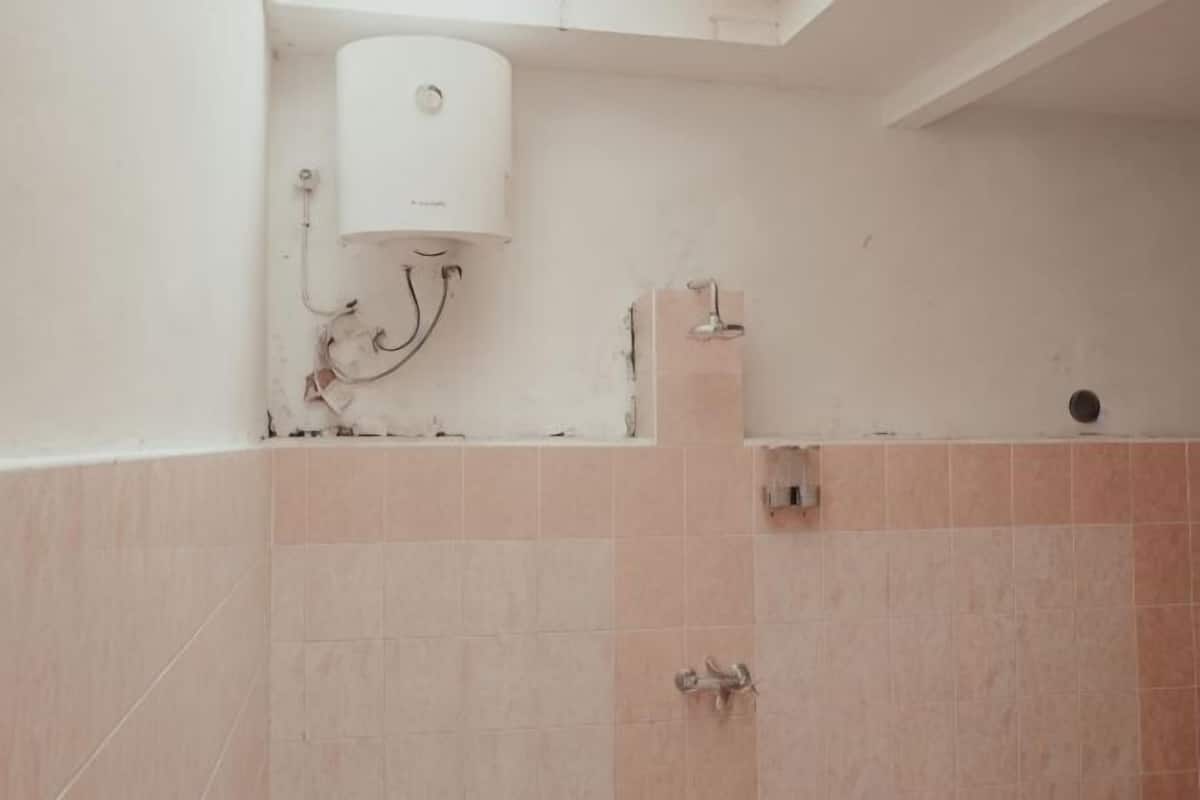 Baño | Regadera y toallas