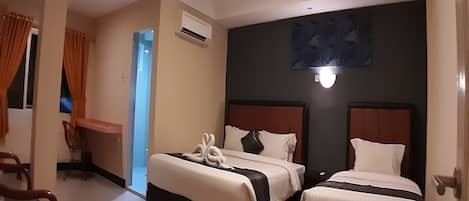 Habitación familiar | 1 dormitorio, escritorio, wifi gratis y ropa de cama