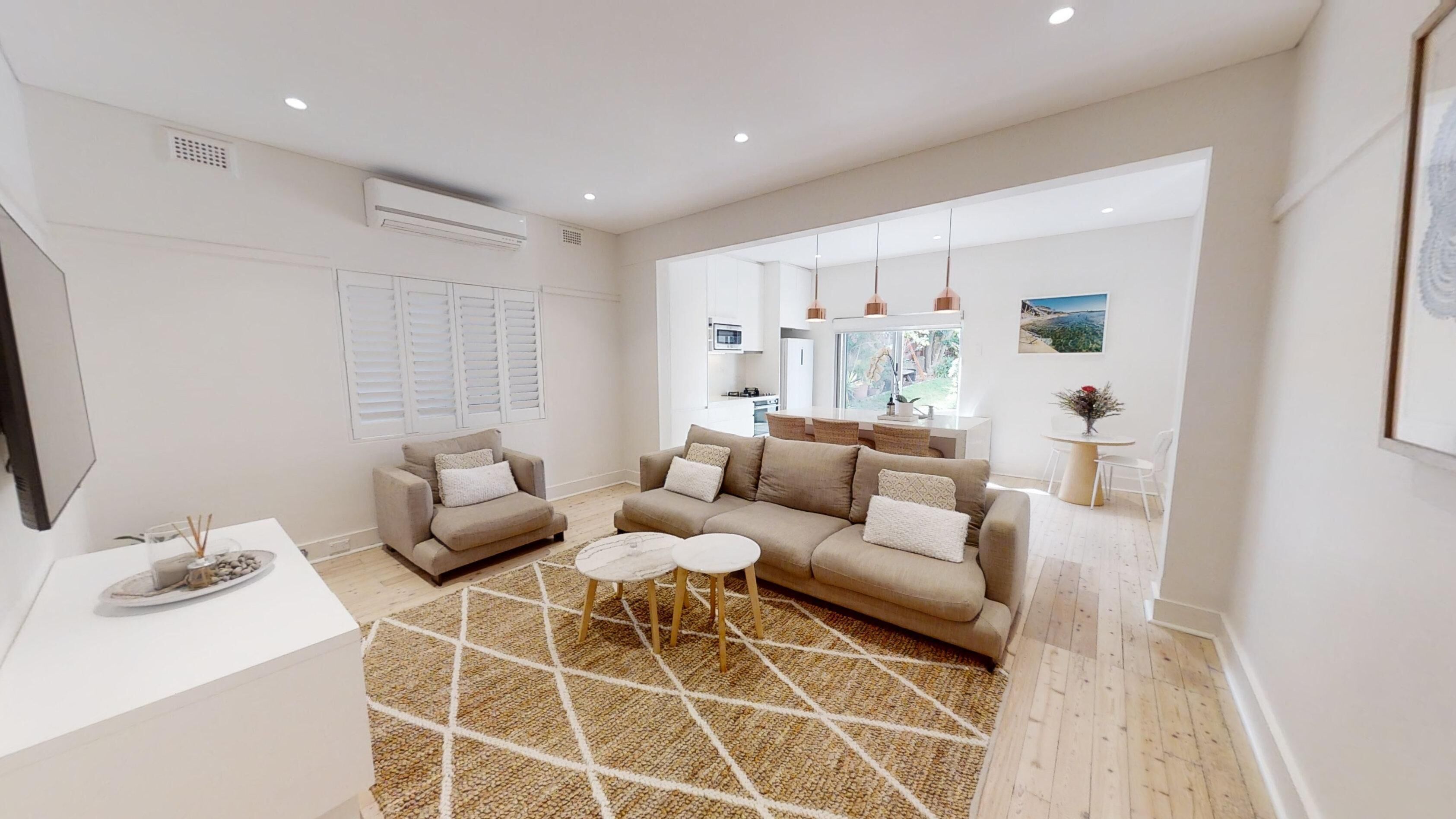 Cozy, bright and welcoming home that has an urban feel near the beach and shops.