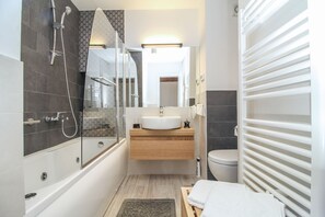 Villa | Bathroom | Combined shower/tub, deep soaking tub, bathrobes, slippers