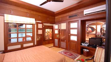 Desk, blackout curtains, bed sheets