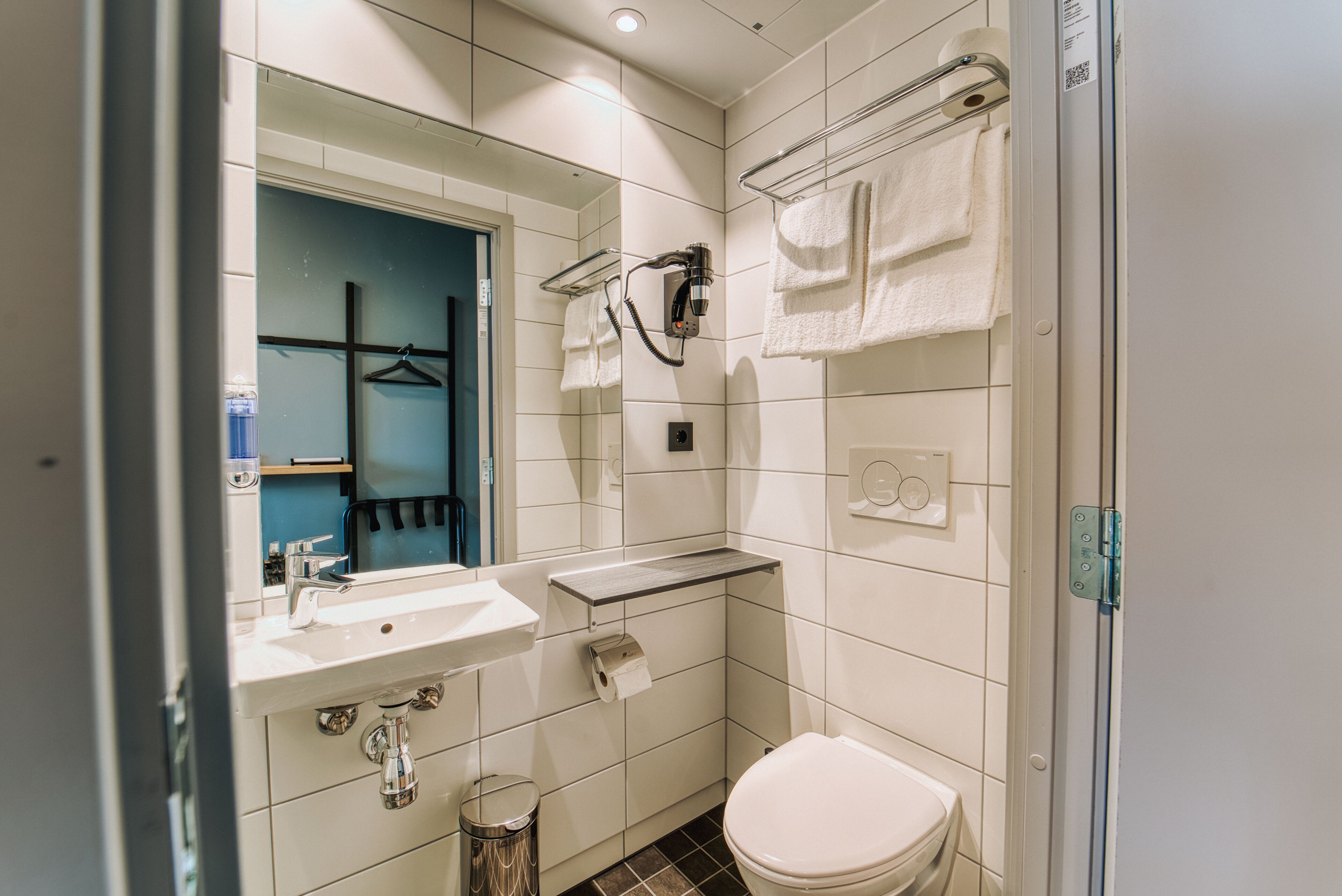 shower, eco-friendly toiletries, hair dryer, towels