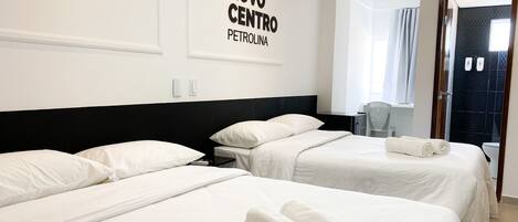 Frigobar, cortinas blackout, quartos à prova de som, Wi-Fi de cortesia