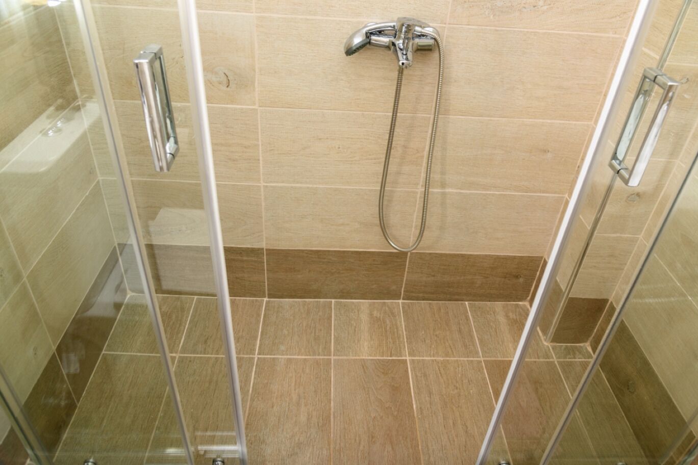 Shower, eco-friendly toiletries, hair dryer, towels