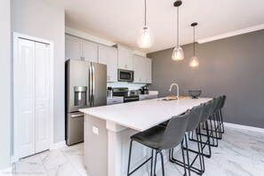 Private kitchen - 4 Bed Storey Lake Resort With Lazy River 4 Bedroom Townhouse by RedAwning (Kissimmee)