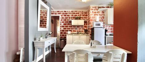 Fridge, microwave, stovetop, coffee/tea maker