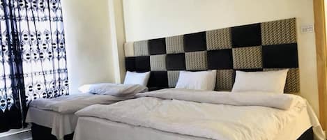 Deluxe driepersoonskamer | Gratis wifi, beddengoed