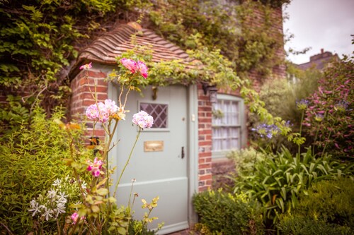 Chocolate-box pretty Pear Tree Cottage in South Downs village