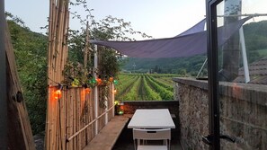 ห้องพัก, 1 ห้องนอน, ลานระเบียง, วิวสวน | บริเวณที่พัก