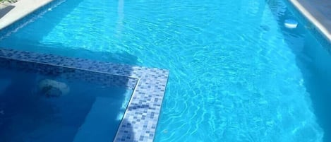 Piscina externa, piscina aquecida