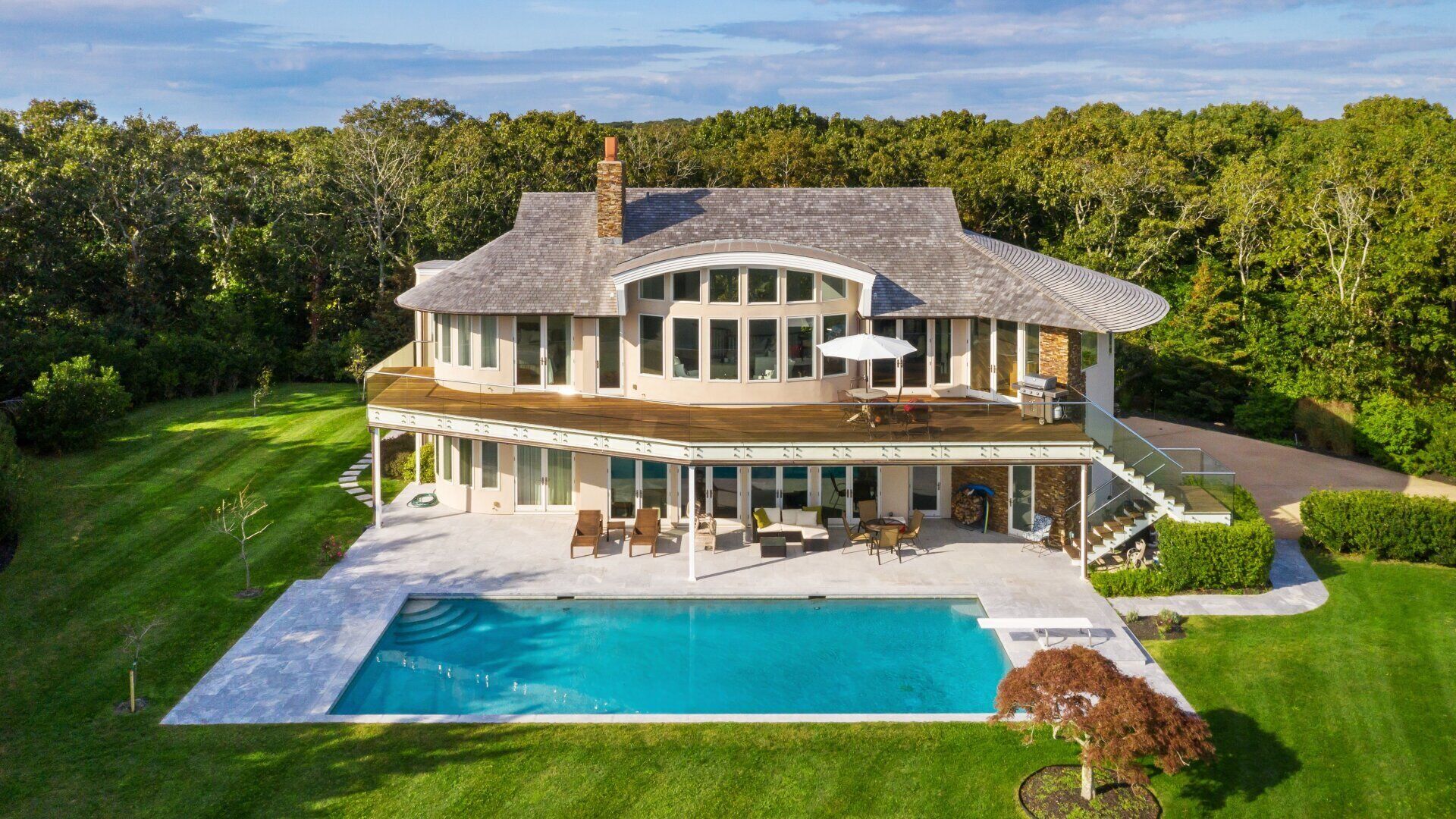 Majestic contemporary beachfront home sited on 1.32 acres with private ...
