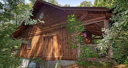 A Laurel Haven, with big porches and a log cabin feel. Fireplace.
