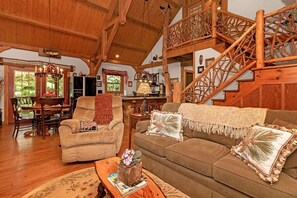 Älytelevisio, takka, DVD-soitin, pöytätennispöytä