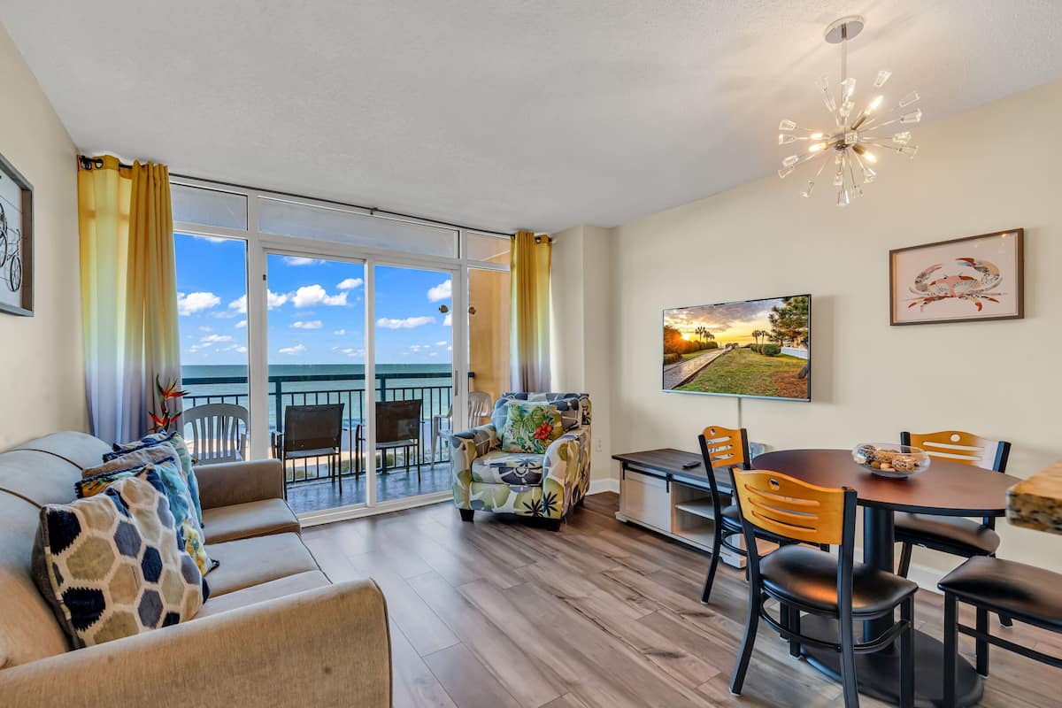 Standard Condo, 2 Bedrooms, Balcony, Ocean View | Living room | 50-inch Smart TV with digital channels