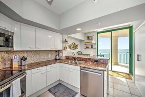 Fridge, microwave, oven, stovetop - 3/2 Oceanfront Condo in Exclusive Cape Marco (Marco island)