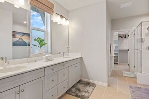 Bathtub, hair dryer, towels, soap