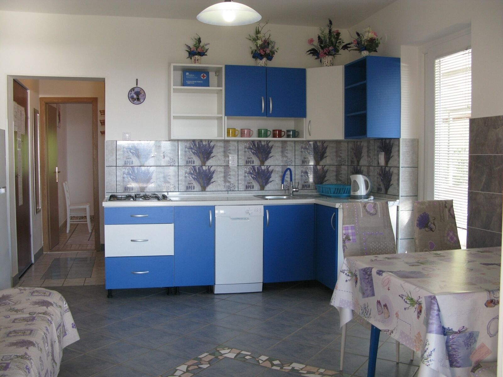 Fridge, coffee/tea maker, cookware/dishes/utensils