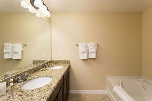 Tina con regadera y secadora de cabello 