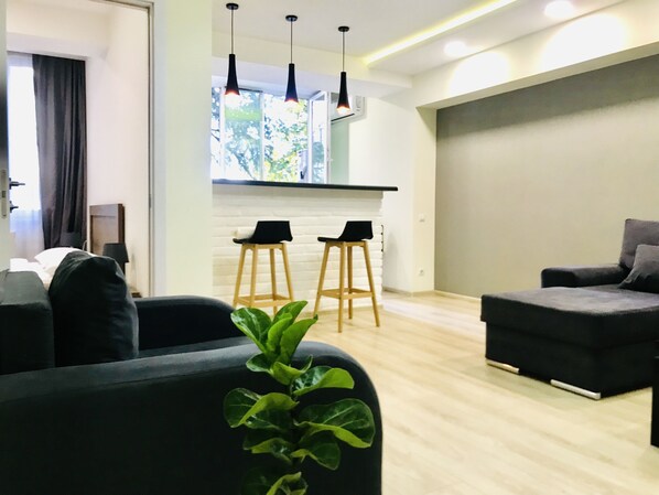 Junior Double Room | Living area | 80-cm flat-screen TV with cable channels, TV - My house on Agmashenebeli street (Tbilisi)