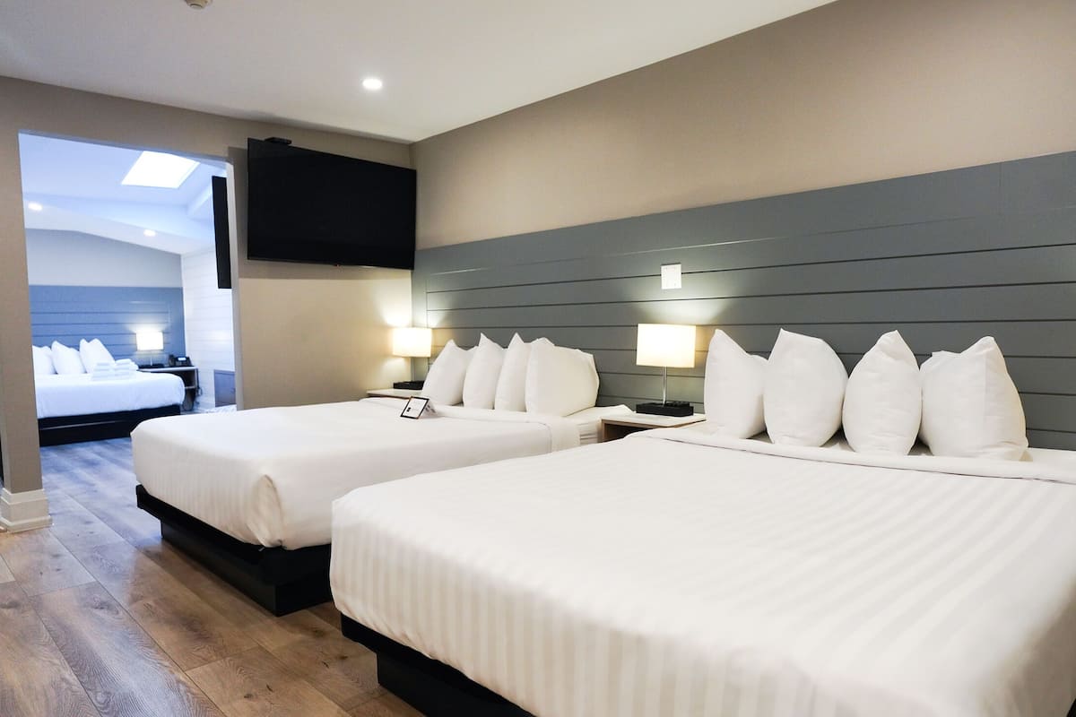 triple queen | 1 bedroom, premium bedding, free wifi, bed sheets