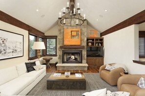 House (Fox Crossing Luxury Home) | Living area | 75-inch flat-screen TV with satellite channels, TV, fireplace