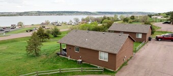 Sleeps 11 and is across the street from Resort, Marina and walking paths.