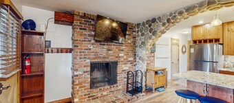 Walkable, well-appointed riverside condo with pool