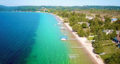 Second floor unit close to downtown Beulah & Crystal Lake for year-round fun!