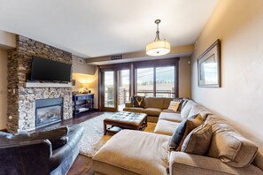 TV, fireplace, table football, books