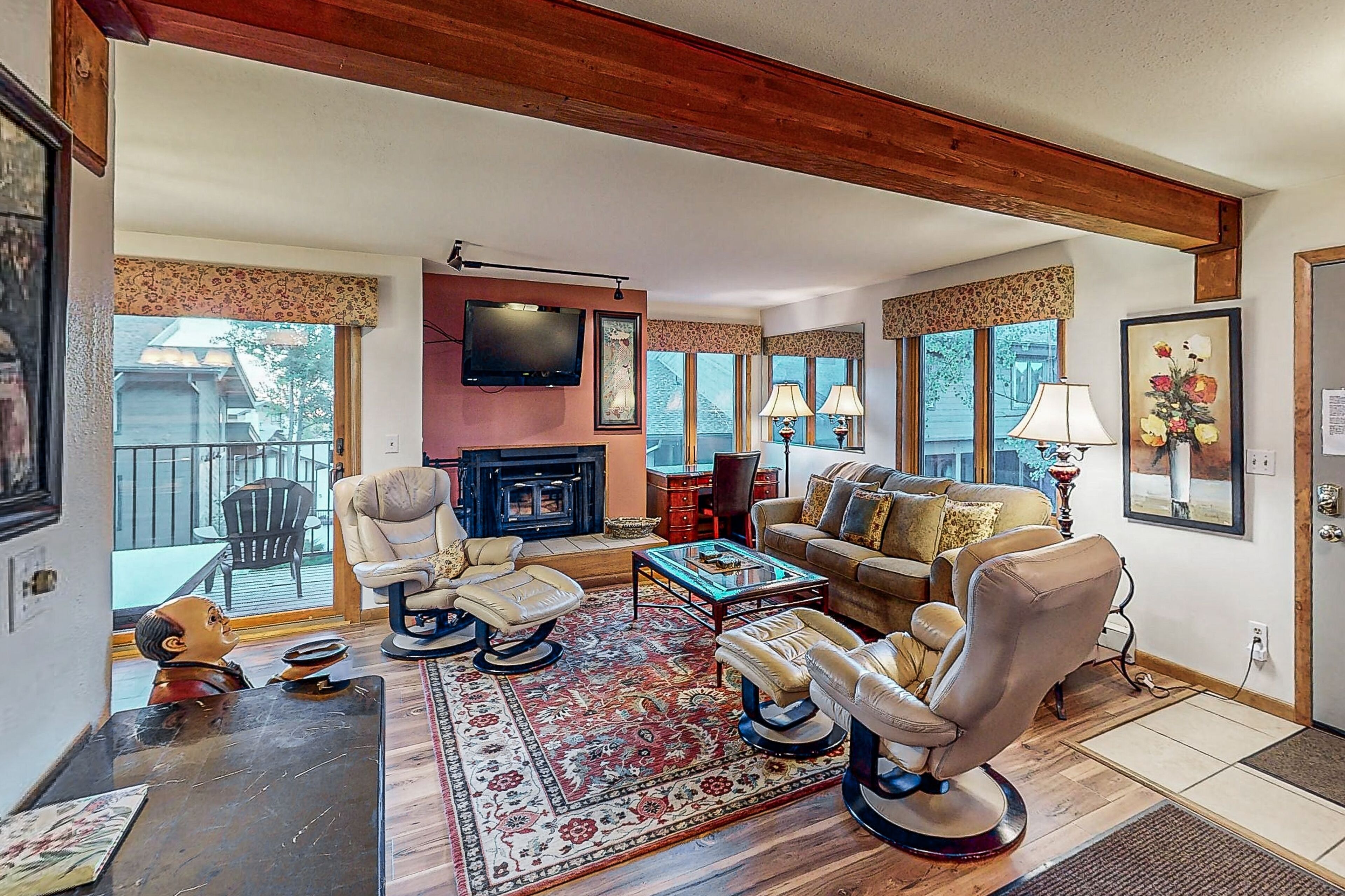 TV, fireplace, books