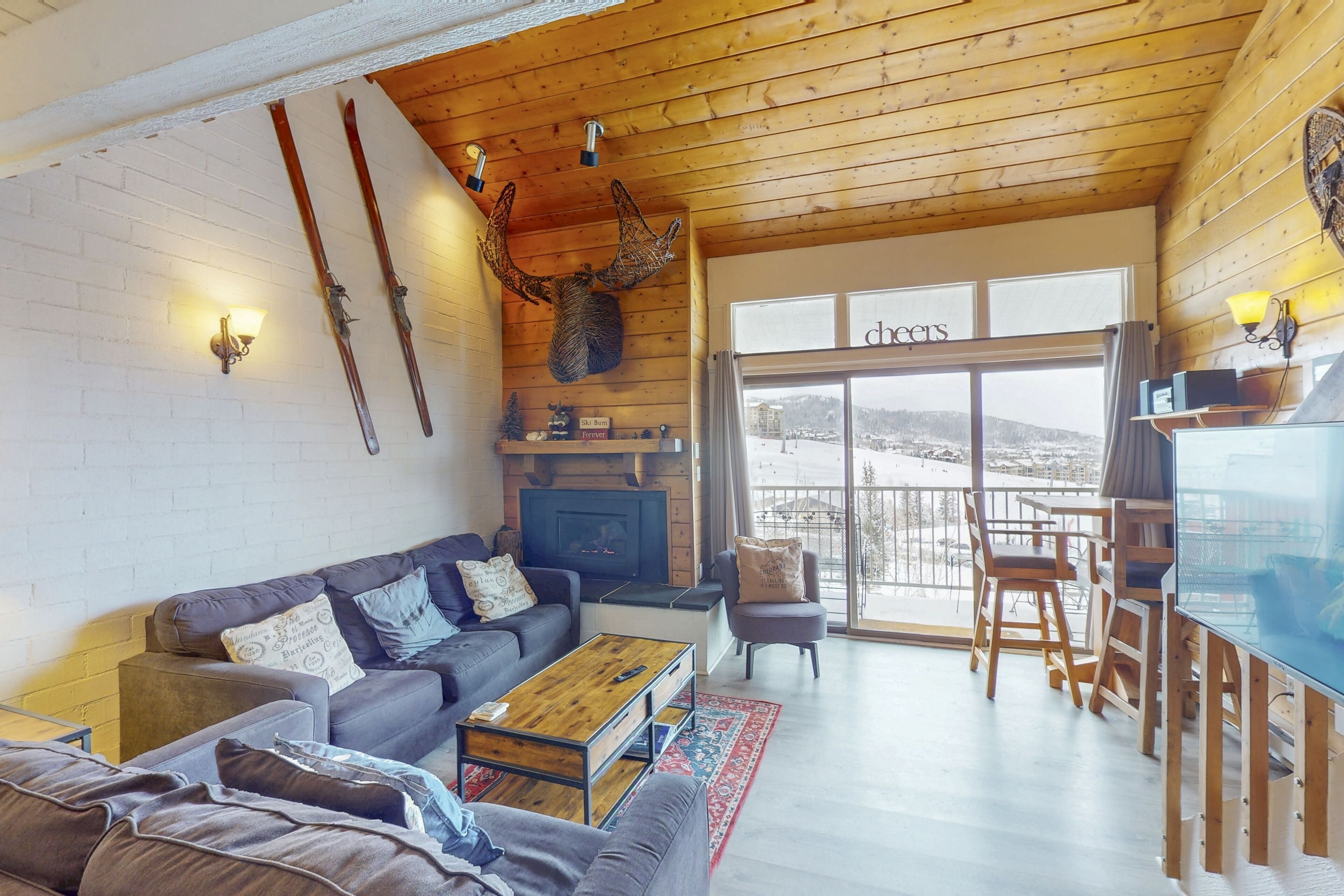 Flat-screen TV, fireplace