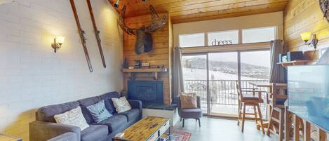 Flat-screen TV, fireplace