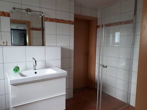 Ducha y secador de pelo