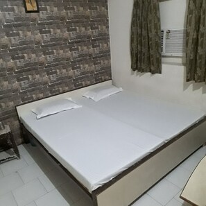 Egyptian cotton sheets, premium bedding, down duvets, memory-foam beds