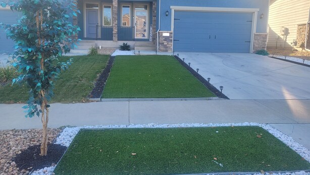 A residential house with a front yard, driveway, and garage. - Cute & Cozy 3 BdRm, 2 1/2 Bath Townhome (Evans)