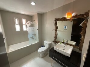 Combined shower/tub, towels, soap, toilet paper