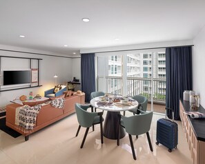 Suite | Living area | 42-inch LED TV with cable channels, TV