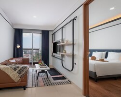 One Bedroom Suite | Escritorio, wifi gratis, ropa de cama