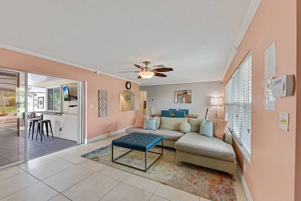 Living room area with a view from the outside.