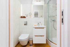 Regadera y shampoo 