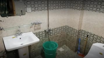 Shower, free toiletries, slippers, towels