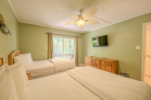 1 bedroom, desk, iron/ironing board, travel crib