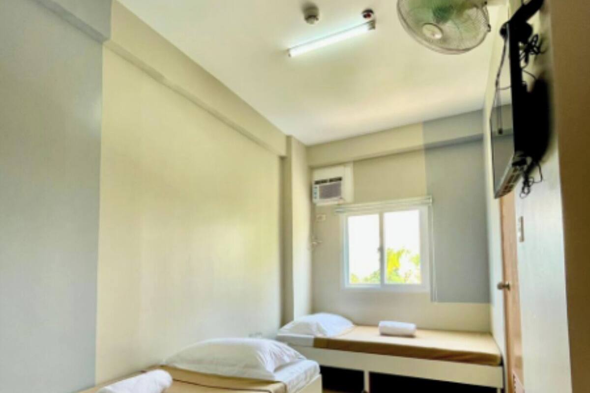 Habitación estándar con 2 camas individuales | Wifi gratis y ropa de cama