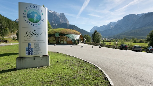 A sign for Trollebachtal Golf, a restaurant and terrascape. - Apartment in Hinterbichl near Ski Bus (Wängle)