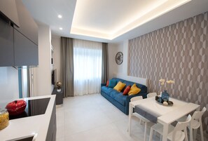 Apartment, 1 Bedroom | Living area | Flat-screen TV - Napoli City Center - Appartamenti e Camere (Naples)