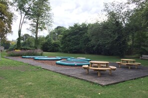 Enjoy leisurely gatherings and active fun on the trampolines and picnic tables amidst lush surroundings.